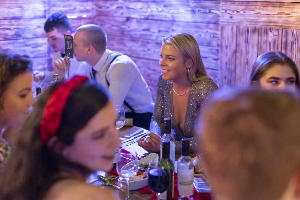 people enjoying a festive feast at racks bar and kitchen, bristol's favourite christmas party venue
